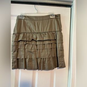 Short tan frilly skirt